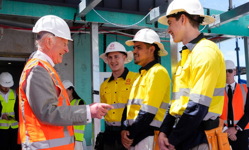 Construction trainees meet The King at new social housing