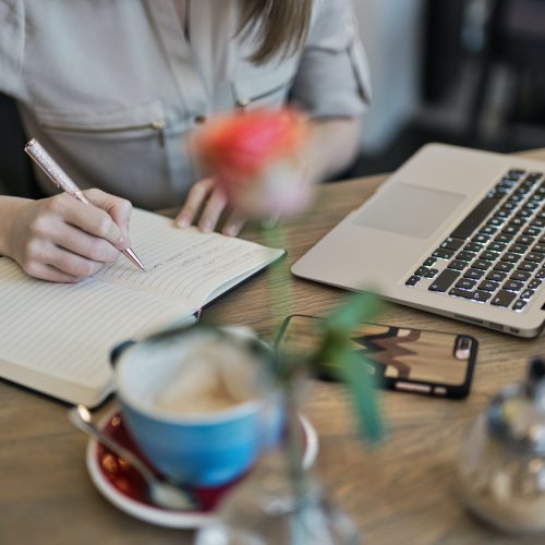 Woman working on a laptop for her business